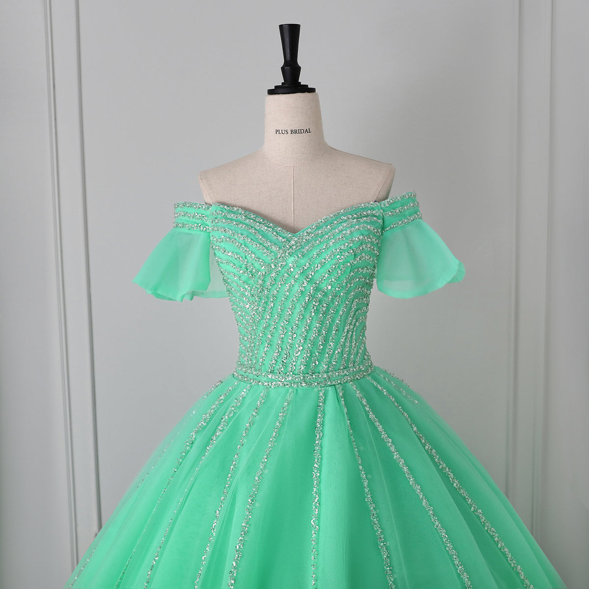 Mint Green Beaded Corset Off-Shoulder Flutter Sleeves Ball Gown - Front View Mannequin Upper