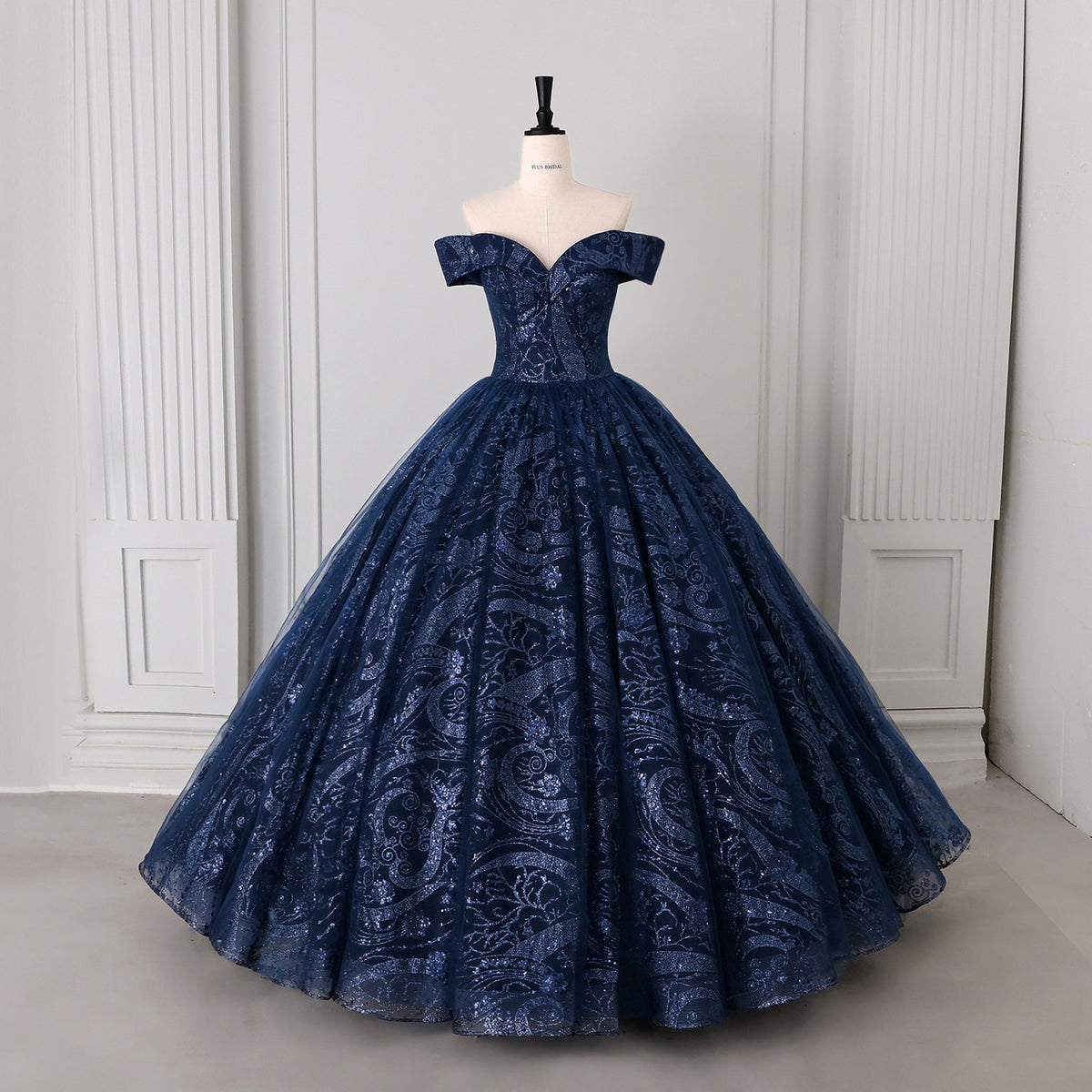 Navy Glitter Tulle Sequined Paisley Off-Shoulder Ball Gown - Front View Mannequin