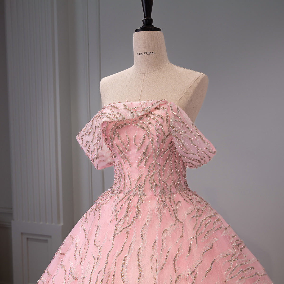Pink Beaded Sequin Wave Stripe Off-Shoulder Ball Gown - Front View Mannequin Upper