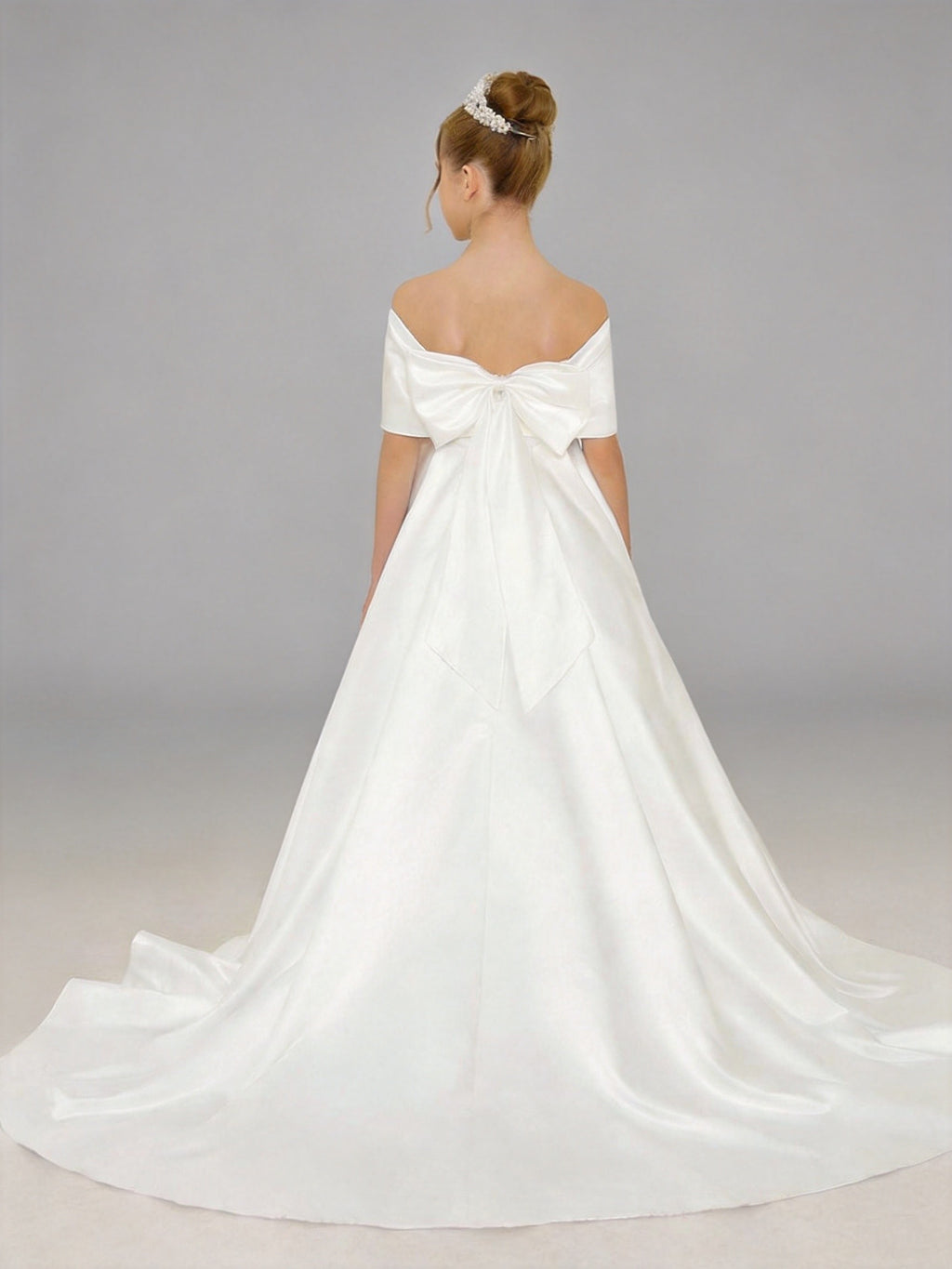 Back view - White satin off-shoulder flower girl dress with bow