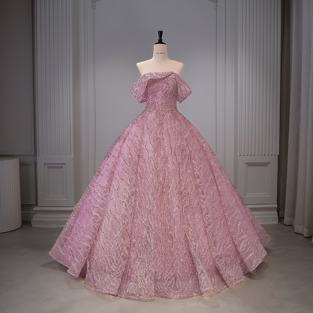 Dusty Rose Beaded Sequin Wave Stripe Off-Shoulder Ball Gown - Front View Mannequin