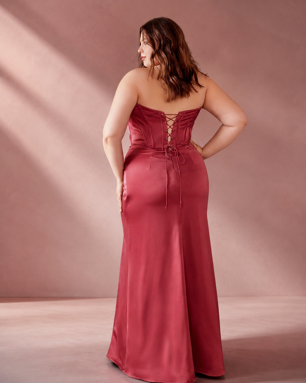 Off-Shoulder Structured Corset Bodice Pleated Satin A-Line Gown - Back View Showing Lace-Up Corset Tie and Satin Skirt in Burgundy