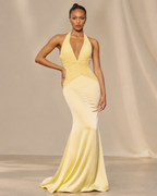 Satin Halter Pleated Chiffon Floor Length Dress in Light Yellow - Front Full View Showing Halter Neckline with Deep V Plunge, Ruched Waist, Gathered Bodice, and Fitted Mermaid Silhouette