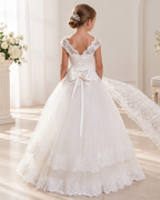 Lace cap sleeve corset lace-up back satin bow tiered ruffle floor-length flower girl dress - back view in ivory