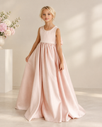 Satin round neckline pearl-trimmed V-back oversized bow floor-length flower girl dress - front view in blush pink