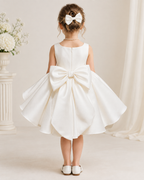 Satin round neckline bow-pickup balloon hem tea-length flower girl dress - back view in ivory