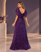 Metallic shimmer pleated sequin cowl-neck off-shoulder cape-sleeve sweep-train evening gown - back view in Orchid purple
